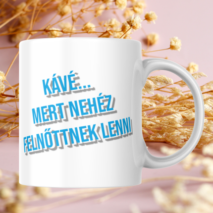 Kávé mert nehéz felnőttnek lenni feliratú vicces bögre kék tipográfiával